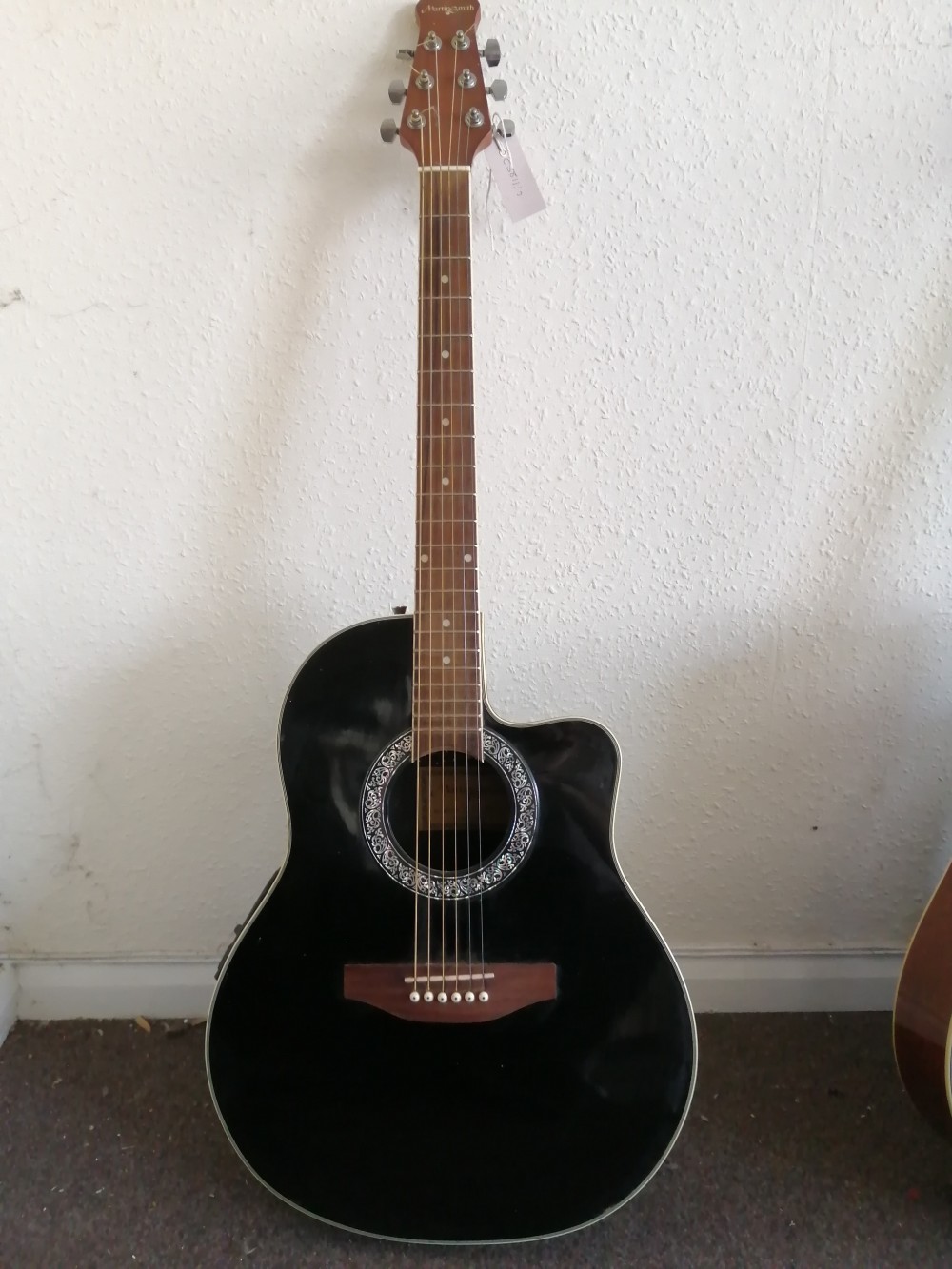 A Martin Smith roundback electro-acoustic guitar